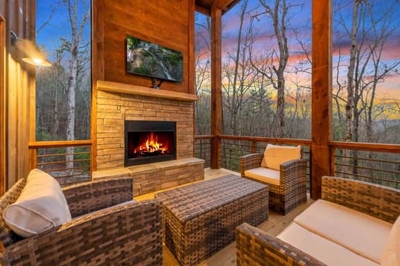 Cozy up on the comfortable outdoor furniture in front of the wood burning fireplace while the kiddos roast marshmallows.  Catch the game on the HD Smart TV on the back deck while enjoying the fresh mountain air.